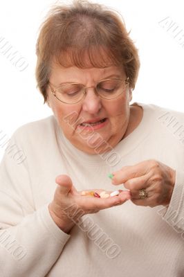 Attractive Senior Woman and Pills
