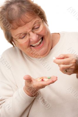 Attractive Senior Woman and Pills
