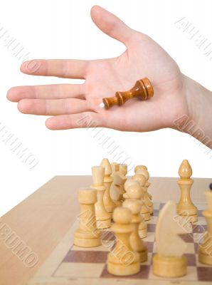 Hand and chess-man