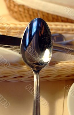 A spoon on the cafe table