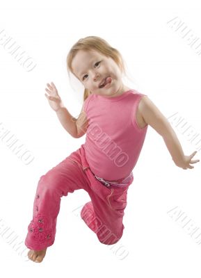 Smal girl in pink is jumping