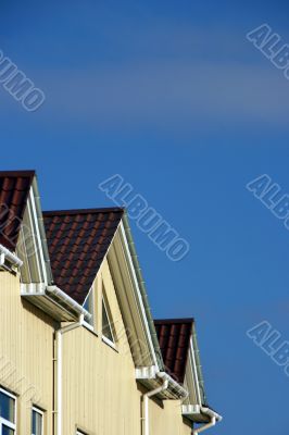 modern urban roof over blue sky