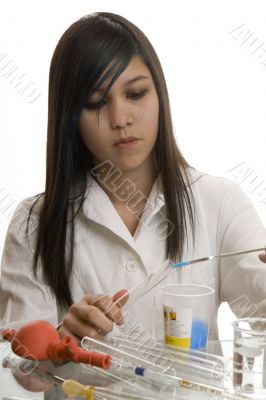 Female student at the education in chemistry