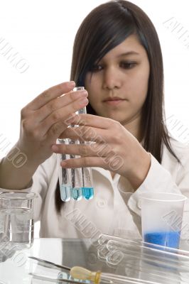 Female student at the education in chemistry