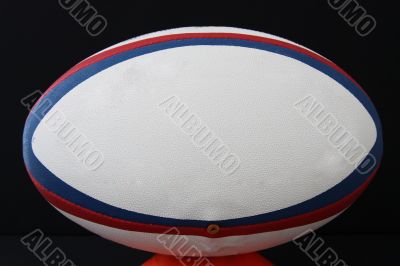 rugby ball on a tee