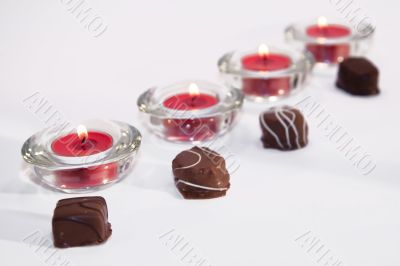 Line of candles and chocolate Line of candles and chocolate