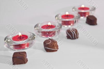 Line of candles and chocolate