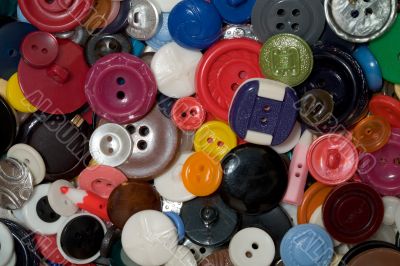 Multicolored plastic and metal button