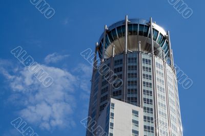 Modern building on background blue sky.