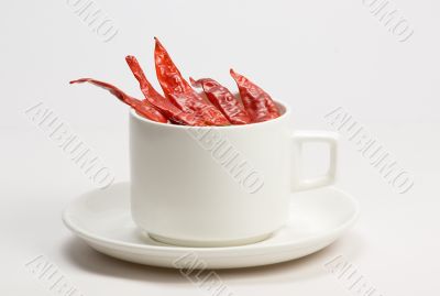 Red chilly in white cup
