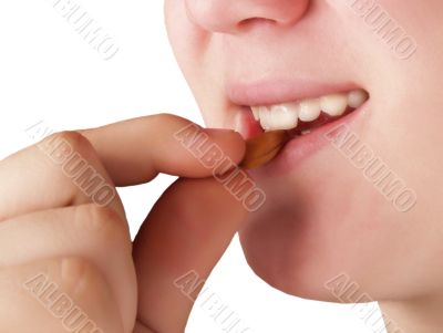 Eats almonds keeps fingers isolated