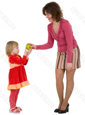 Woman, little girl and apple