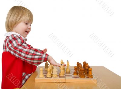 Little girl play chess