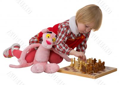 Little girl play chess