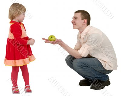 Young man, apple and little girl