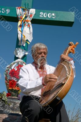 Senior ukrainian musician with bandura