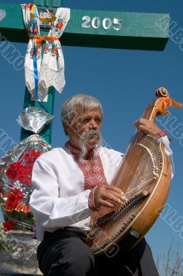 Senior ukrainian musician with bandura