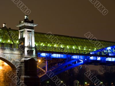 Highlighted bridge construction at night.
