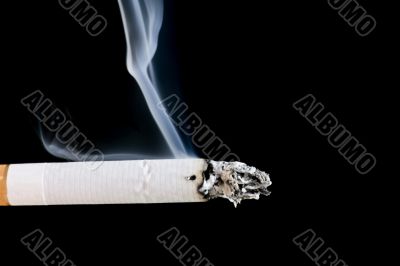 cigarette with smoke closeup