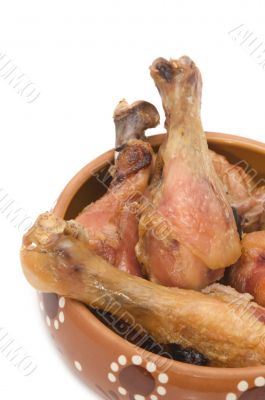 chicken leg in dish closeup