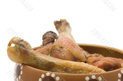 chicken leg in dish