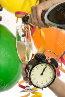 Turn of the year, New Year with champagne and clock Turn of the year, New Year with champagne and clock