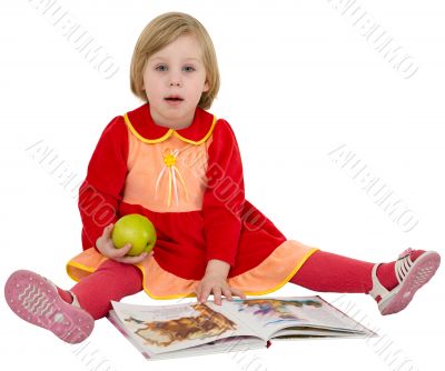Little girl reading a book