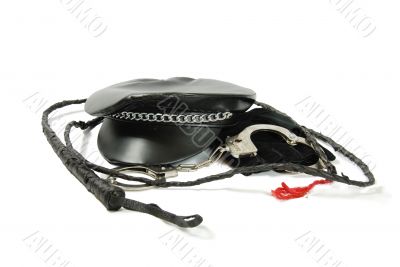 Biker cap with chain, handcuffs and whip