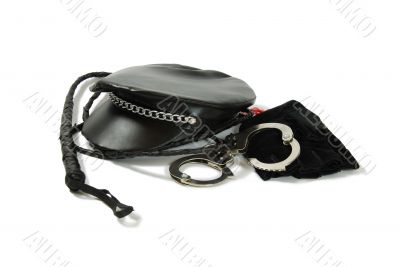 Whip, handcuffs, whip, biker hat with chain