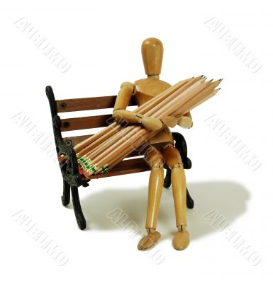 Person holding pencils