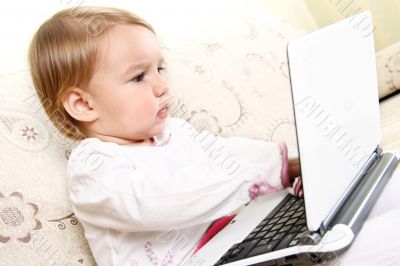 Small girl with laptop