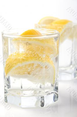 glasses with soda water and lemon glasses with soda water and lemon