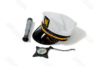 Compass, telescope and nautical cap