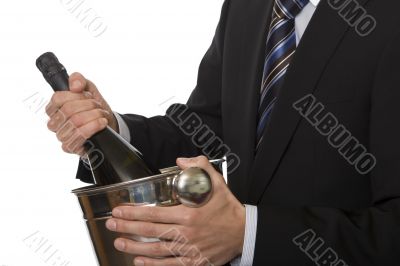 Man with suit champagne bottle in ice-pail