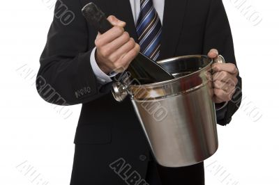 Man with suit champagne bottle in ice-pail