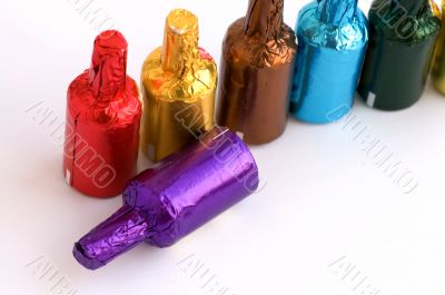 Colorful chocolate bottles