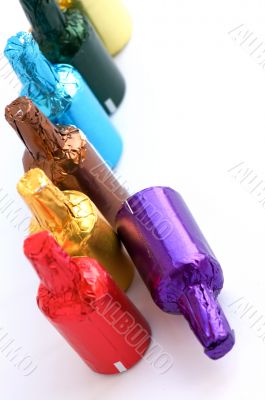 Colorful chocolate bottles