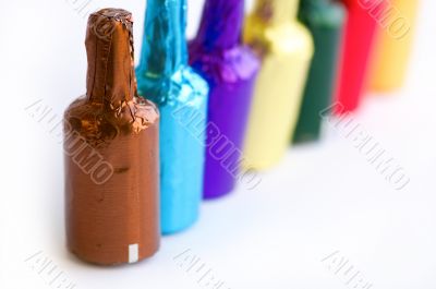 Colorful chocolate bottles