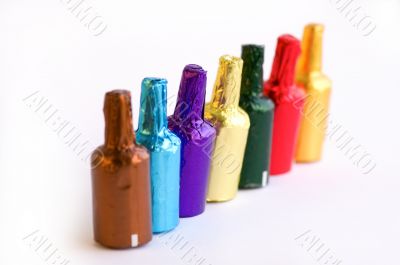 Colorful chocolate bottles