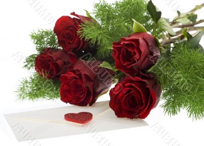 red roses with love letter