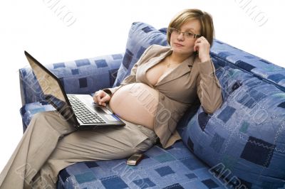 Young pregnancy woman at homework
