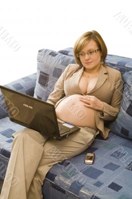 Young pregnancy woman at homework