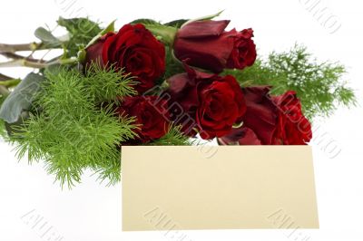 red roses with a cream-colored place card red roses with a cream-colored place card