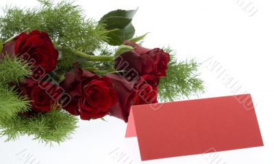 red roses with a red place card red roses with a red place card