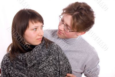 The girl and the man look against each other