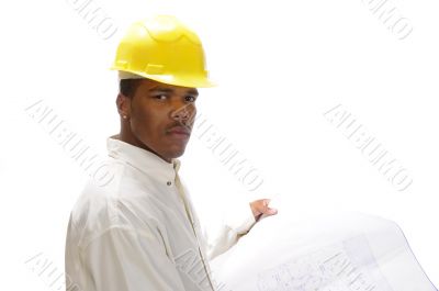 African American engineer studying house plans