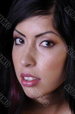 Beautiful hispanic young woman in closeup
