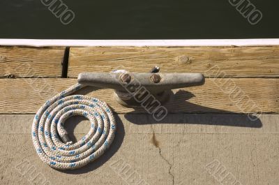 Rope coiled up attached to cleat