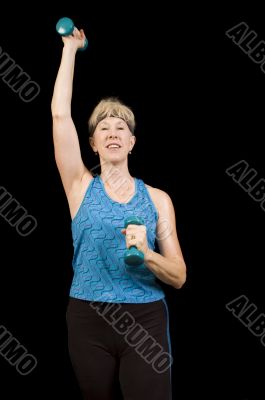 Attractive baby-boomer woman exercising