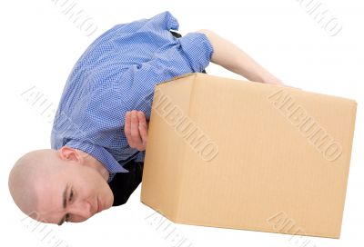 Man looking under cardboard box
